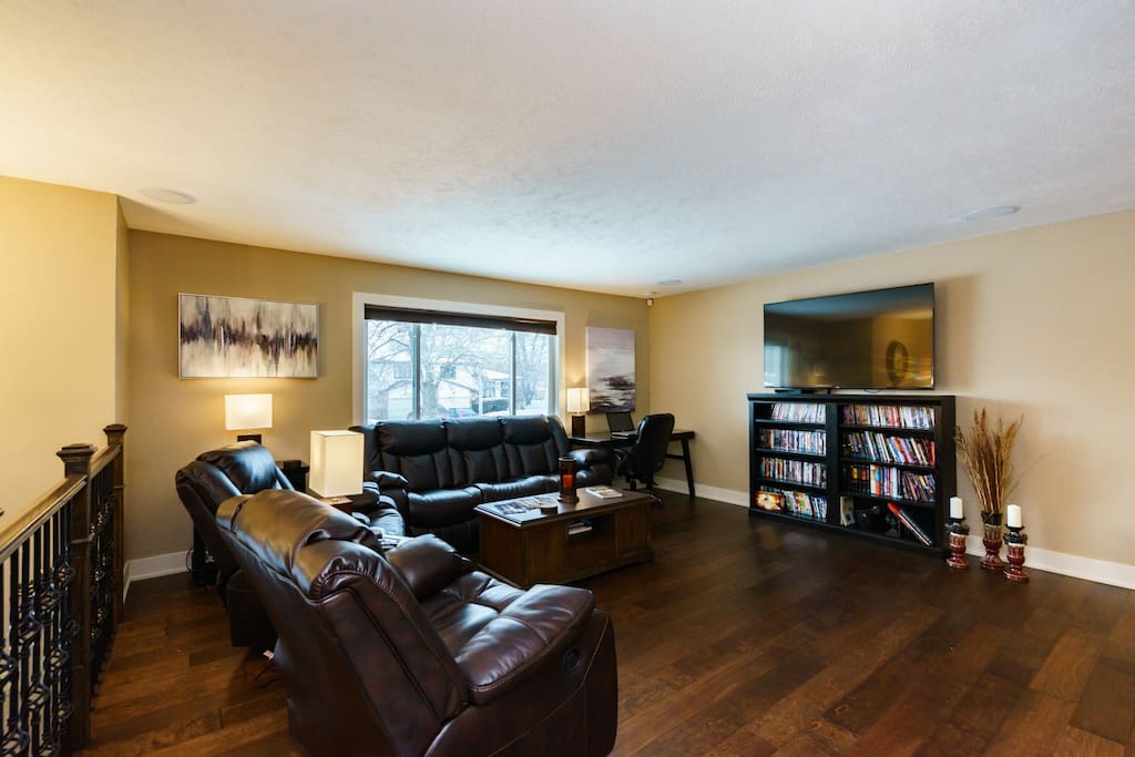 Spacious living room with large SMART TV