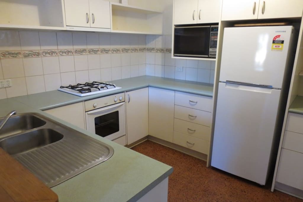Kitchen is bright and clean too! We like to keep it that way