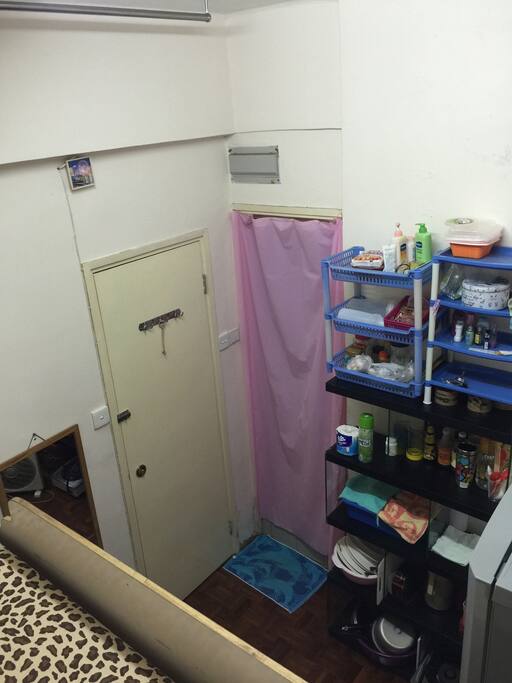 Main door or Door room and private bathroom or toilet with water heater and exhaust fan. (Pink Curtain).