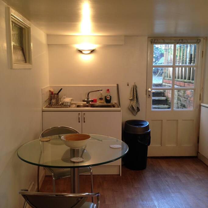 Kitchen leading to the entrance.