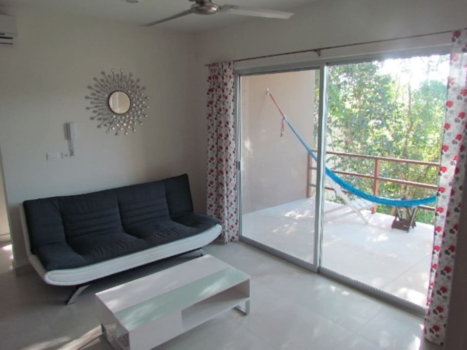 Open living room with balcony