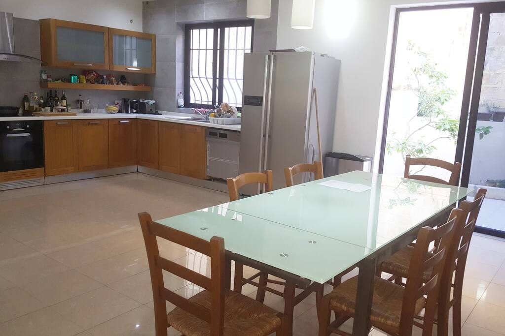 Magnificent kitchen with courtyard behind it, state-of-the-art equipment and spacious for all your culinary desires.