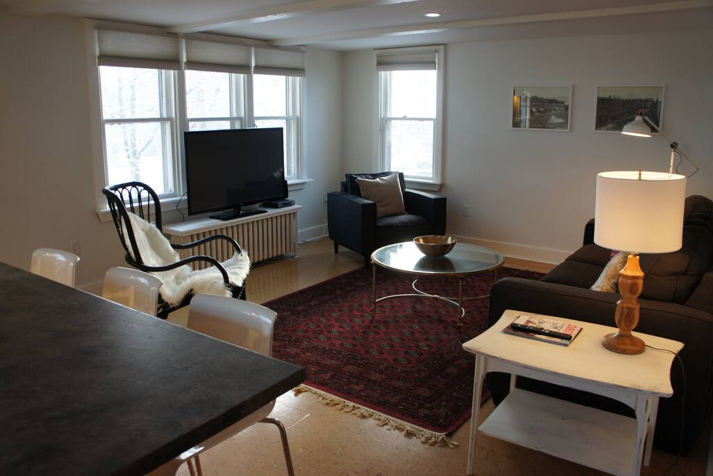 Open Concept Living Room with large, flat-screen TV