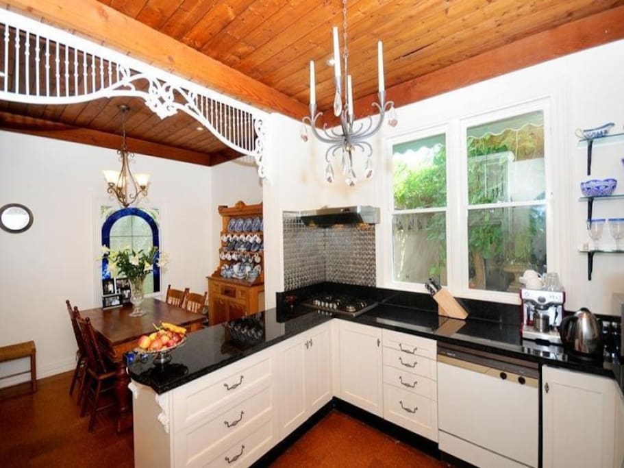 the kitchen is large, light and fully modernised near is one of the dining areas