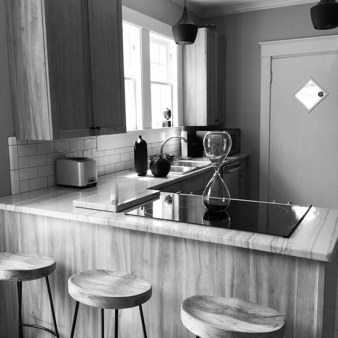 Modern Kitchen with Natural Wood and Black Accents