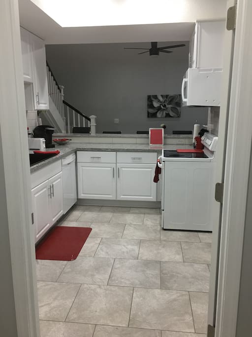Kitchen - Open floor plan, granite counter tops and tile floor.