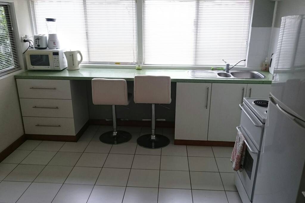 Light filled fully equipped kitchen