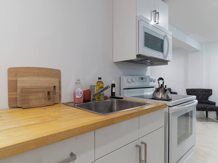 The basement apartment includes a full kitchenette.