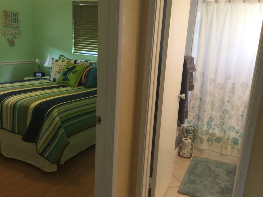 View of your room and private adjacent bathroom from hall.