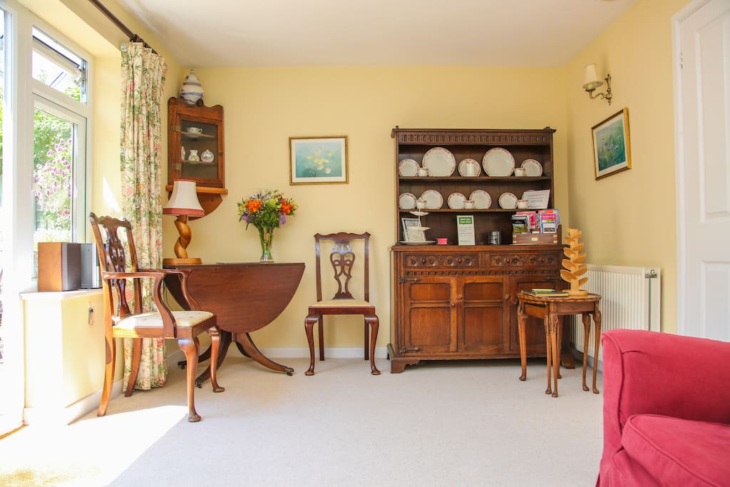 Sitting/dining room. Lovely sunny room.