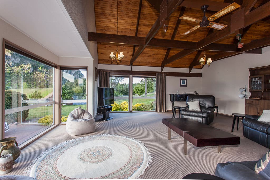 Spacious lounge includes grand piano and bar area