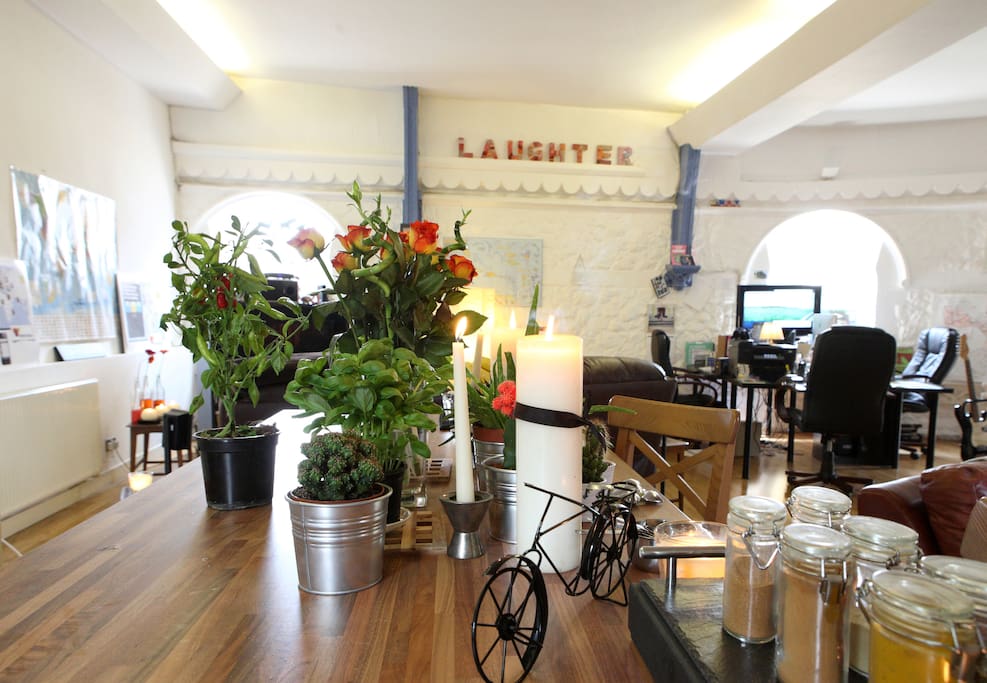 The HUGE living / kitchen area, fresh herbs, fresh flowers and natural light all round