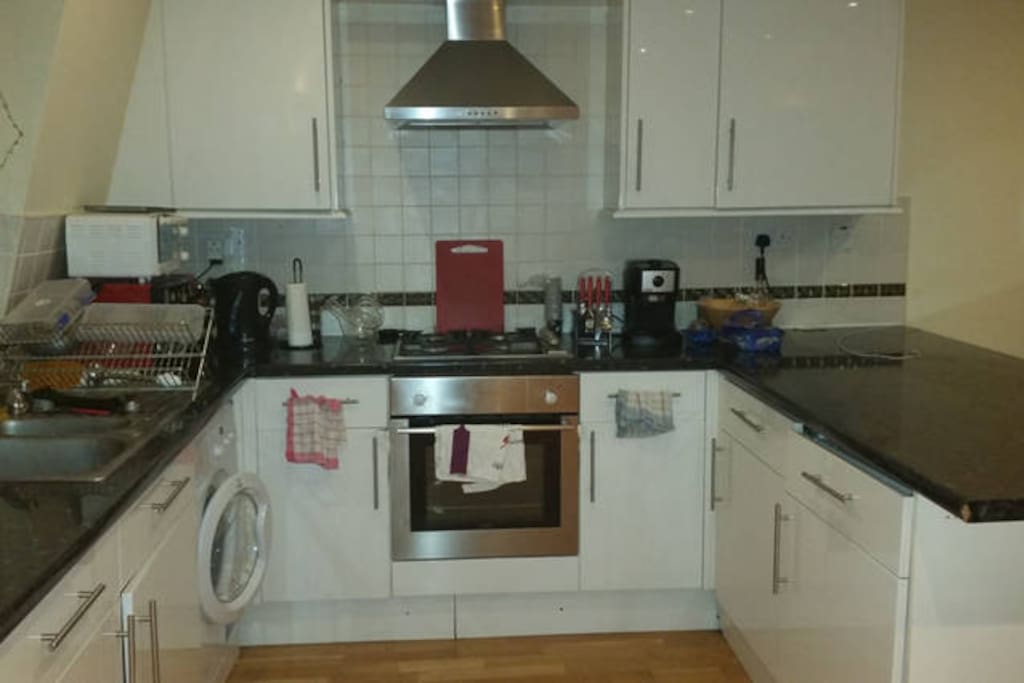 Fully equipped kitchen with oven, microwave, gas hob, fridge, freezer, dish washer, washing machine, etc...