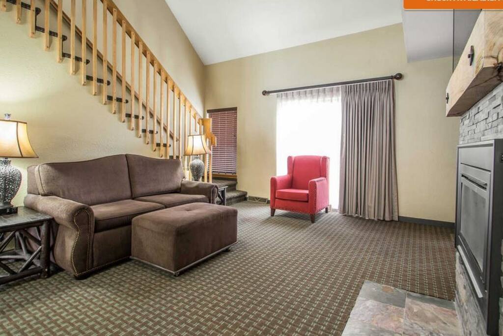 Living area with TV and fireplace