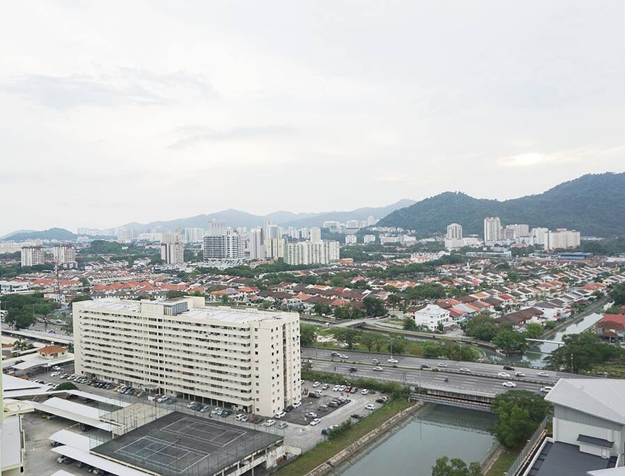 The mountain and city view from the window. You may get to watch the airplane flying in the sky if the timing is right.