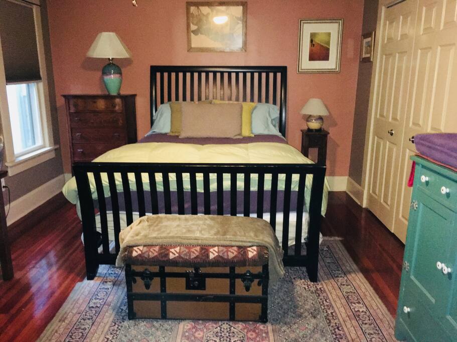 Your room with queen size bed, large closet, sitting area, TV and mini fridge.