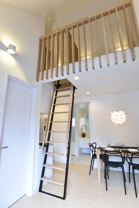 Mezzanine floor is accessed by ladder.