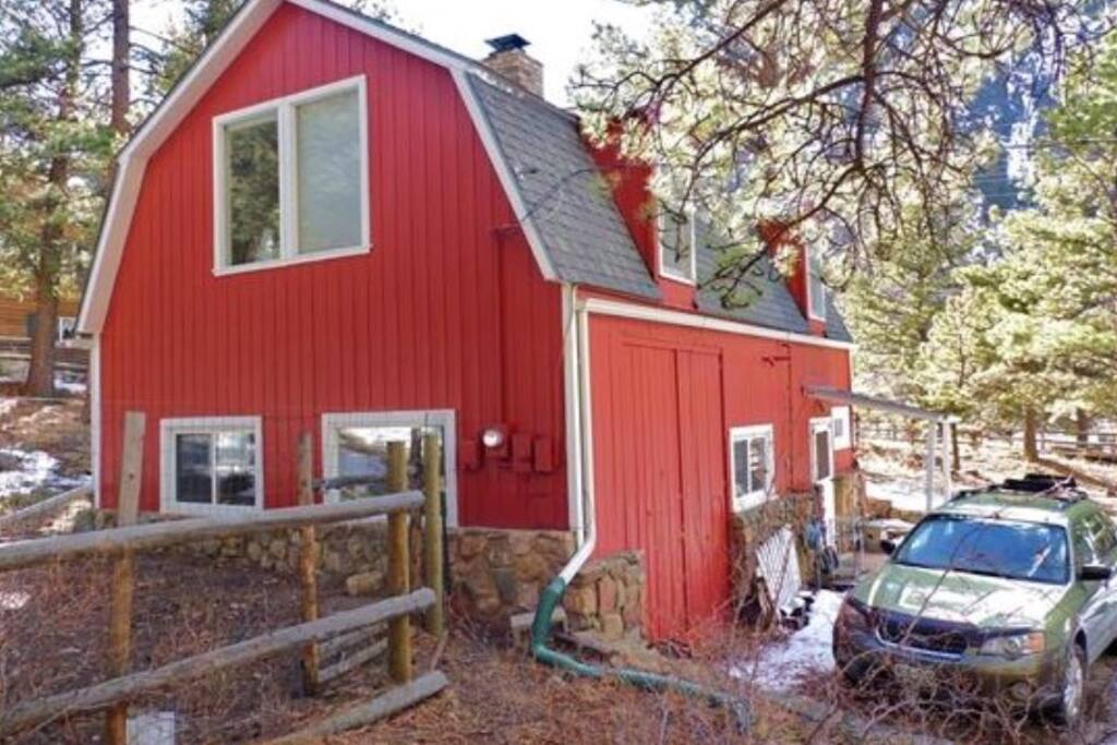 View from the back/mountainside of the house, looking toward the road. Parking is right by the front door.