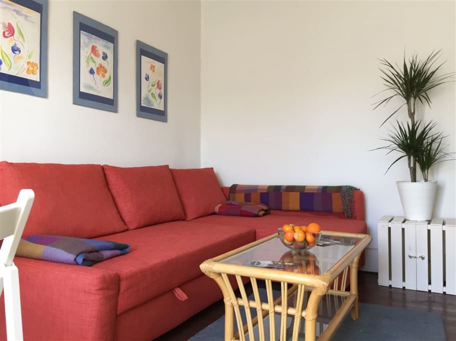 The freshly decorated living room has a comfortable double sofa bed (sleeps 2)