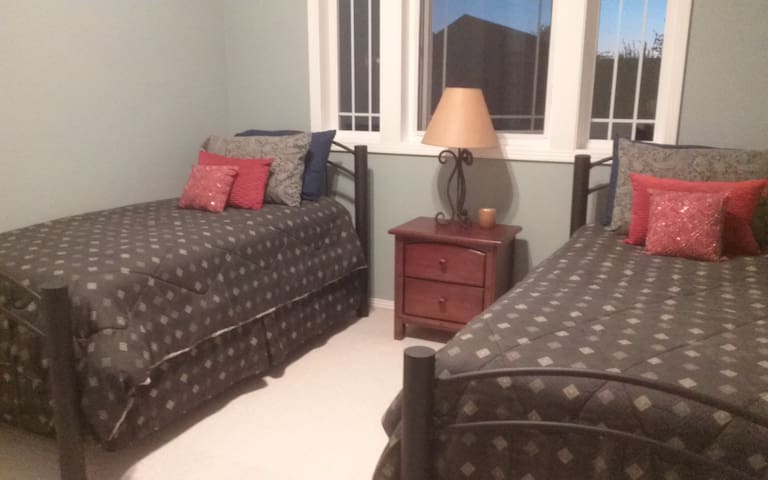 Two restful and cozy beds with private bath