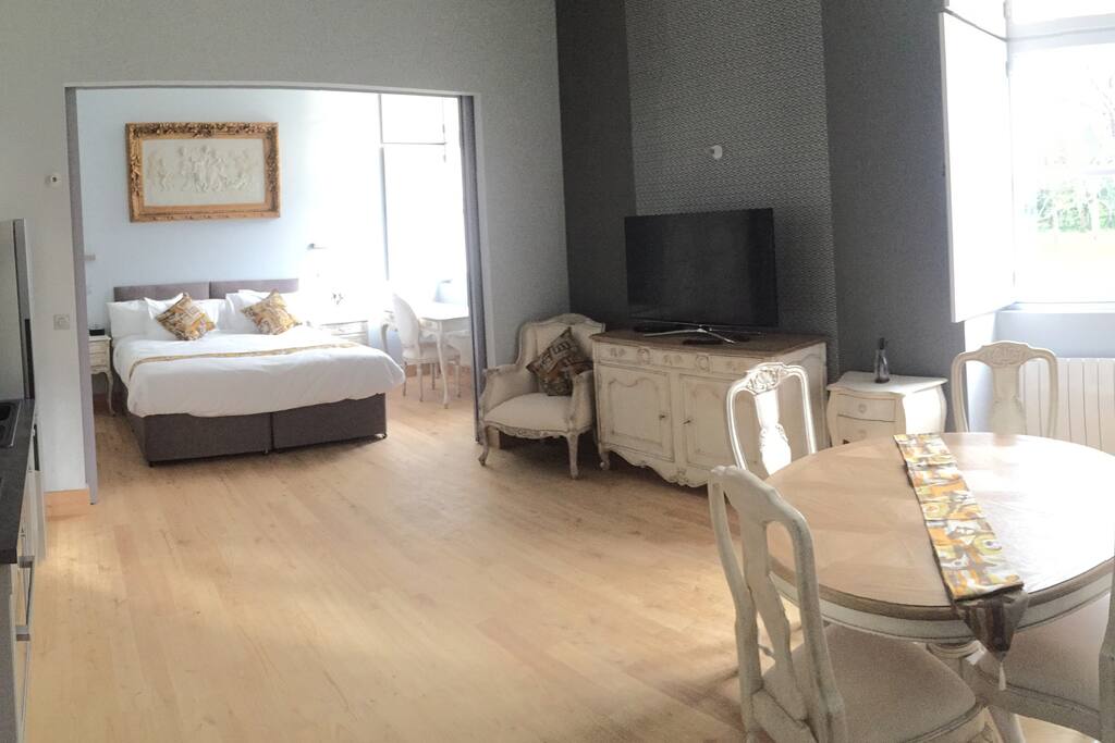 Bedroom is separated from the living area with sliding doors.