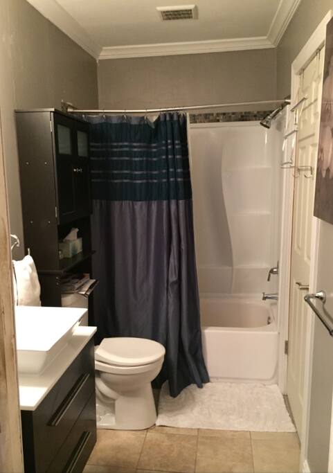 Guest private full bath. Shampoo, conditioner, and body wash/soap are provided.