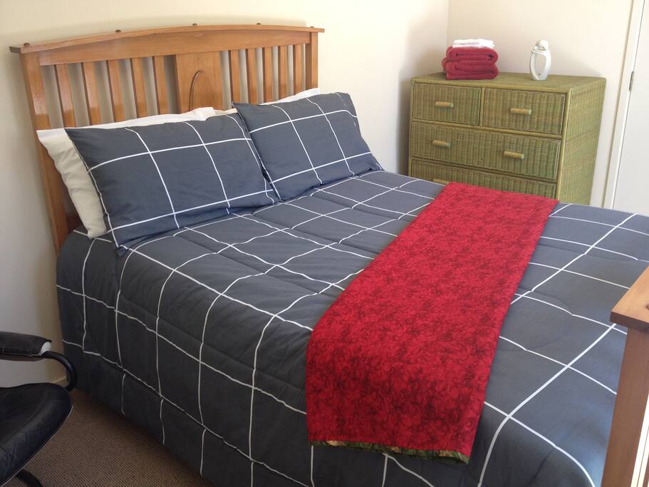 Comfy double bed in The Nest.