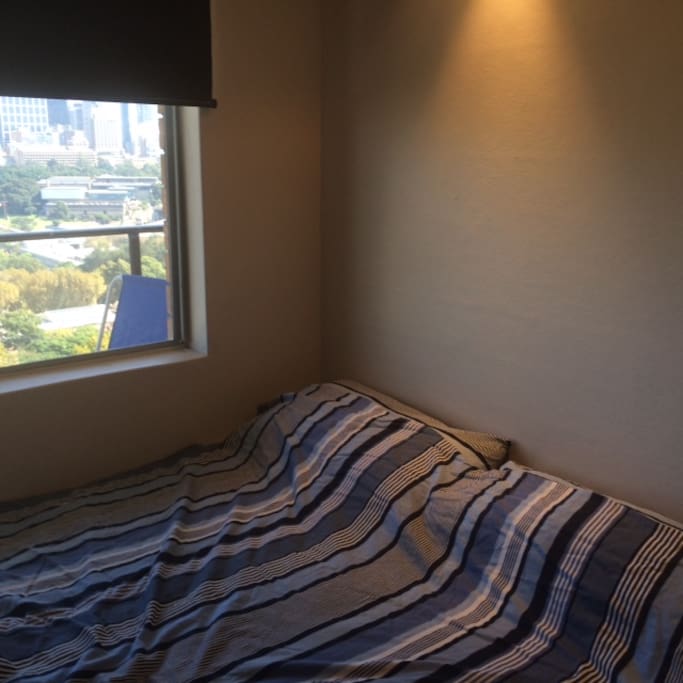Comfy double bed with harbour views