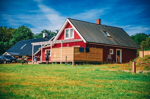 Close to nature home with a wood-fired hot tub, WIFi, boat