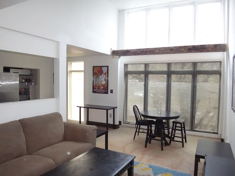 Front room has vaulted 14 foot ceiling and faces east