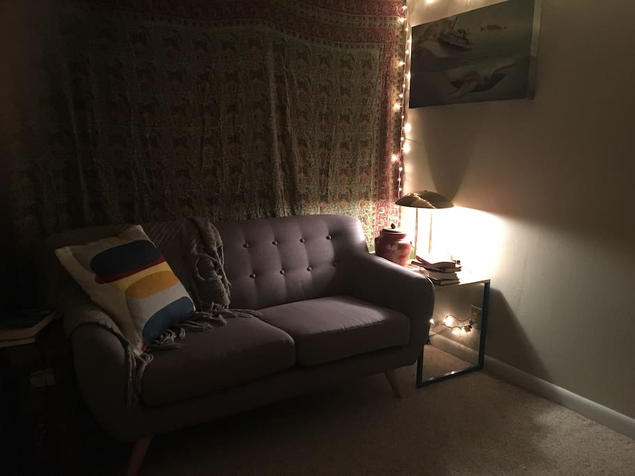 Bohemian styled moody livingroom that's connected to your bedroom and is totally private.
