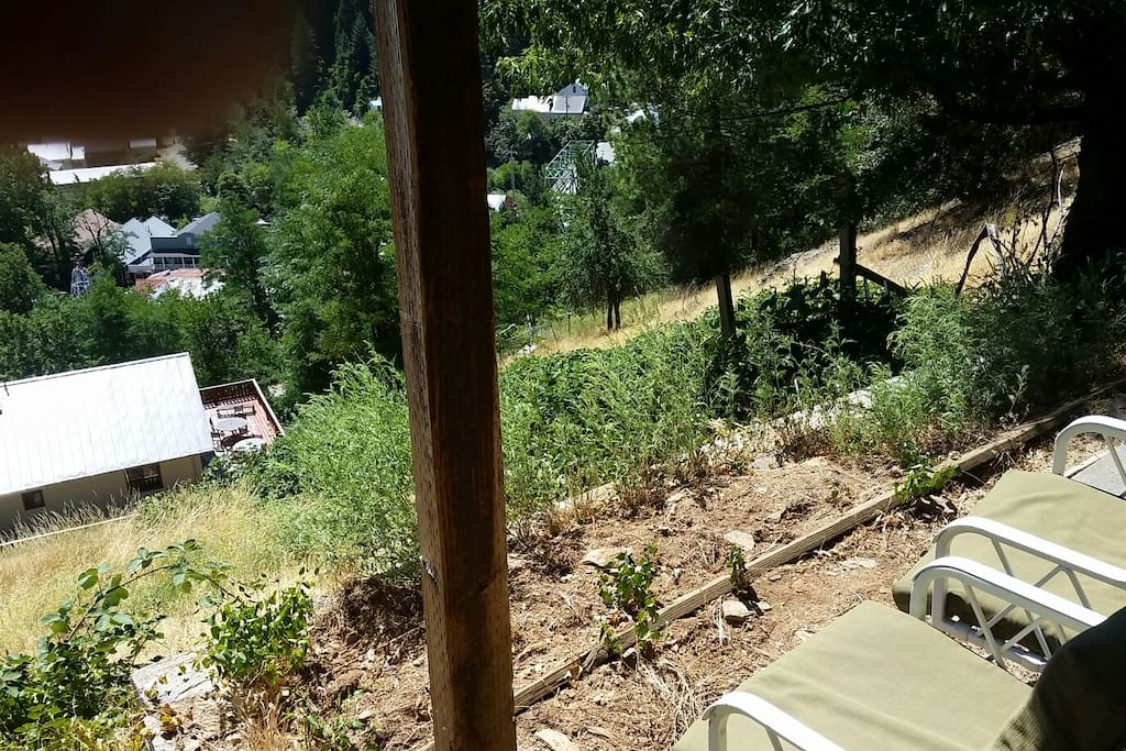 Enjoy view into town from outdoor seating under deck.