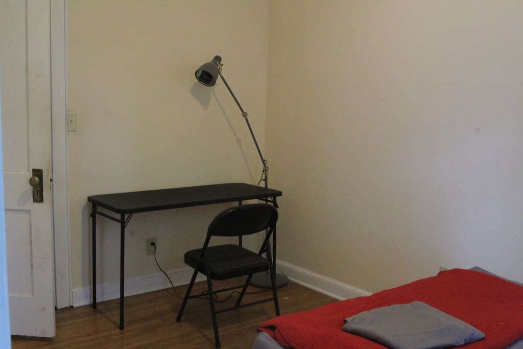 desk with lamp and chair