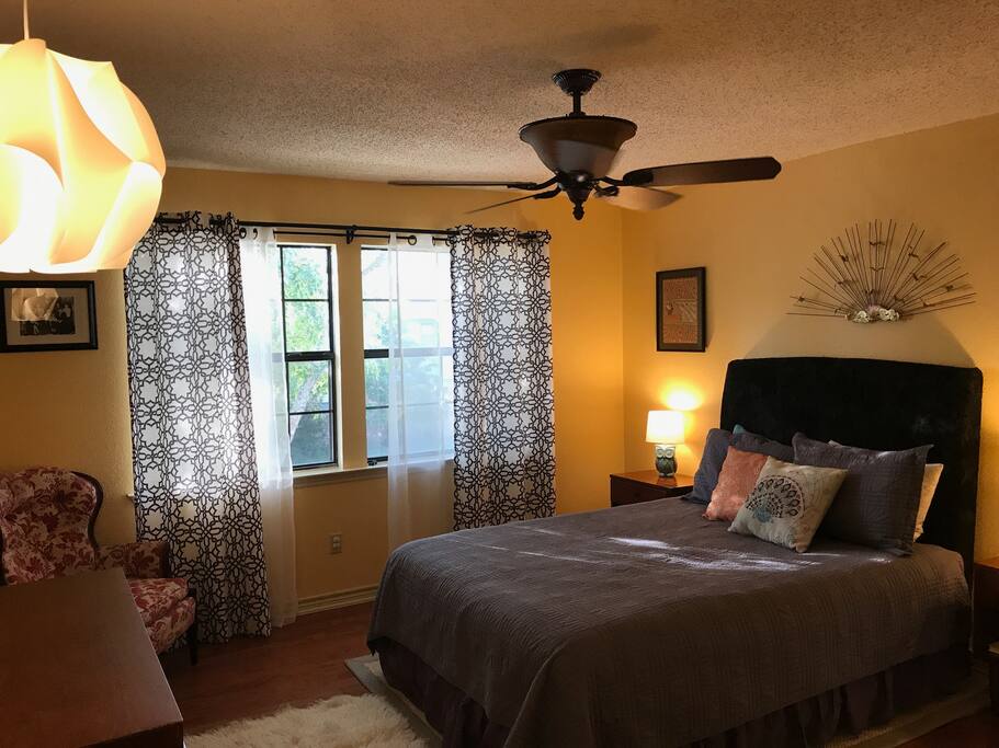 Master bedroom with queen-sized bed and attached master bath.