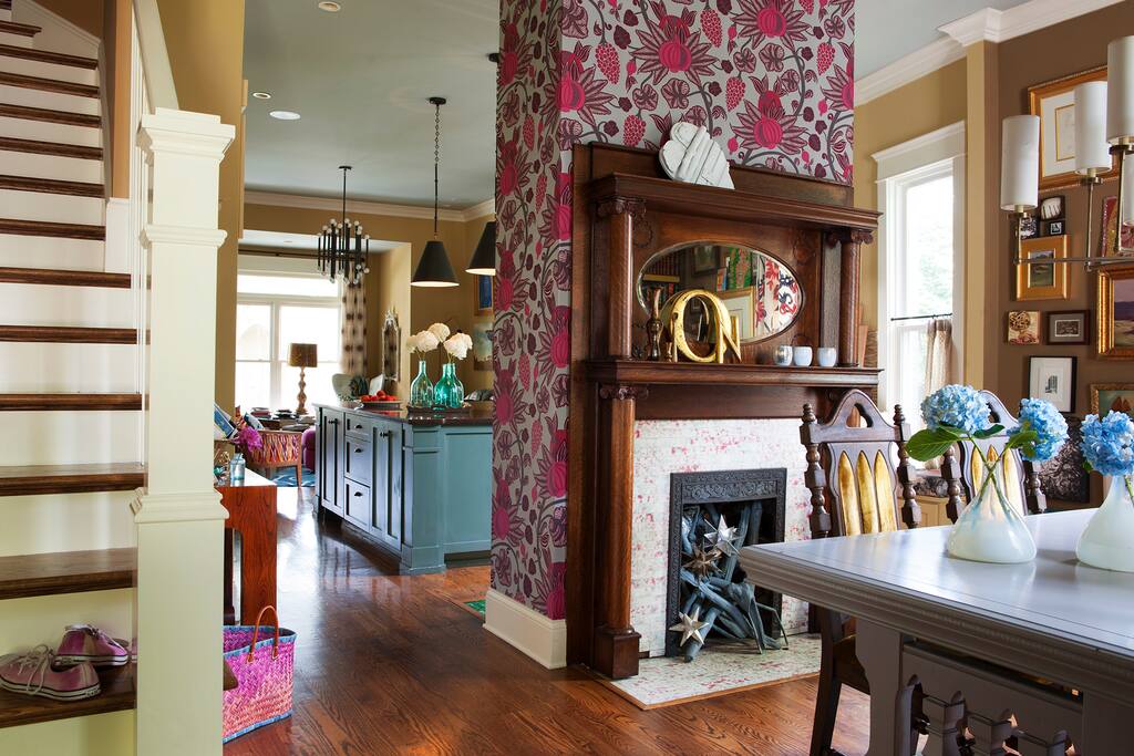 Eclectic layered decorating style embraces you as you walk in the home. Open floor plan with 11ft ceiling a large kitchen island and living room towards the back of the house.