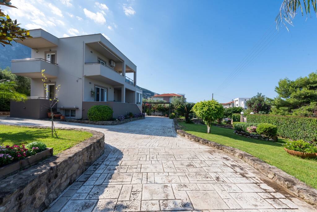 Villa, parking area & garden