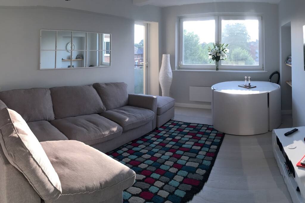 Lounge with dining table. Full use of tv!