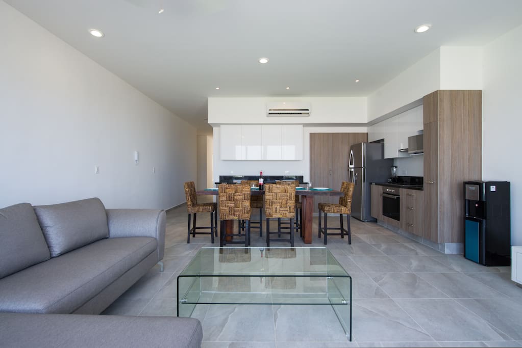 Living area, dining room and kitchen