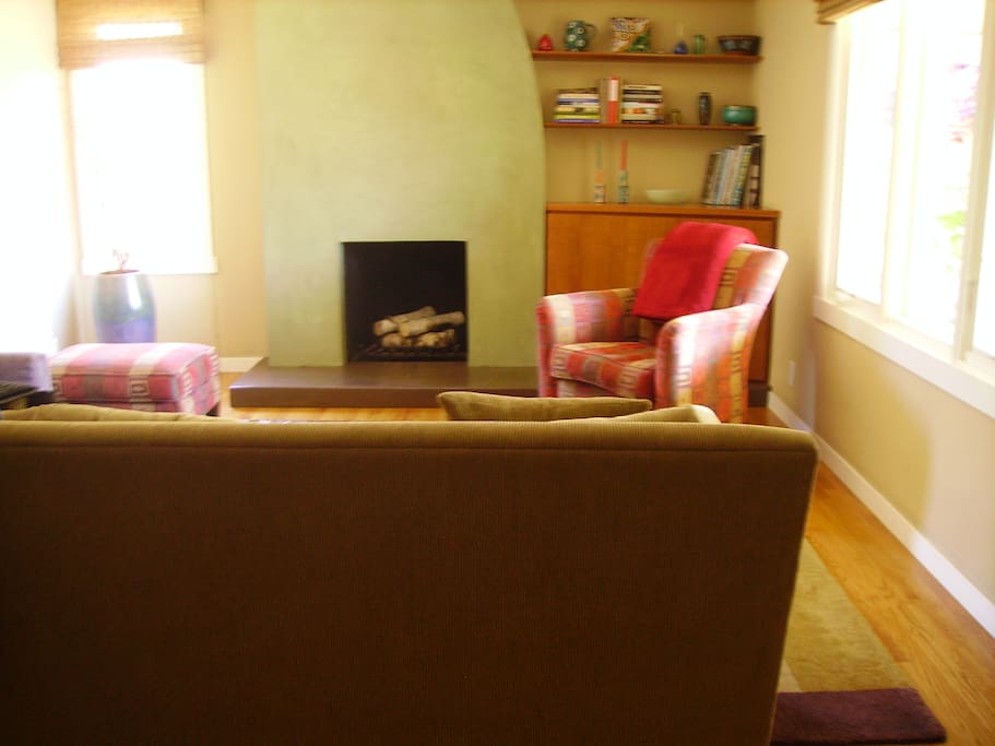 Comfortable living room with architect-designed fireplace.