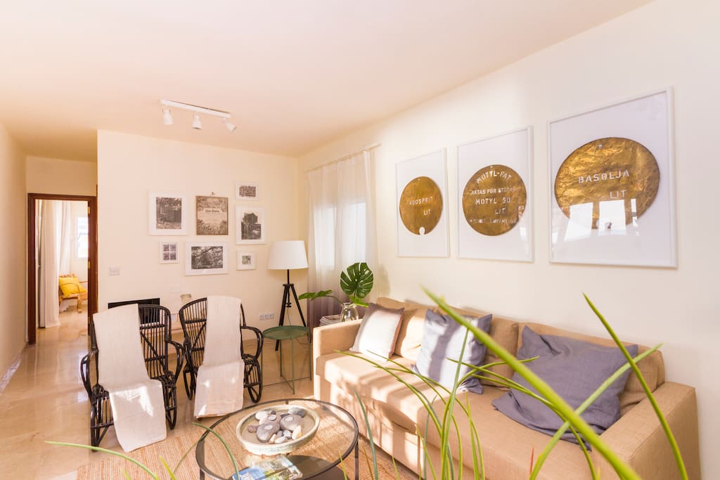 Living area which opens up onto the terrace and balcony