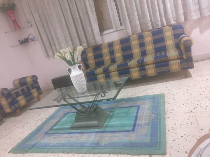 Huge and spacious drawing room where u can entertain ur guests.It consists of false ceilin,led lights ,a huge and beautiful sofa, lovely central table on a very beautiful floor carpet.Size of drawing room is 300 sq.feet