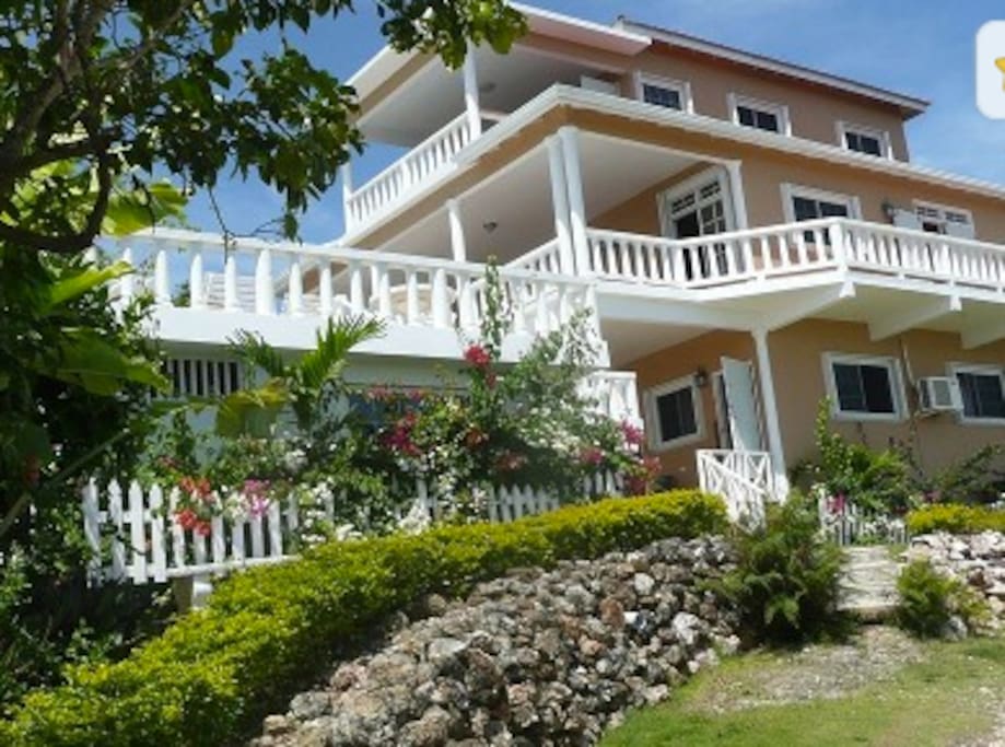 Lush tropical flowers and fruit trees add to the beauty of our villa.