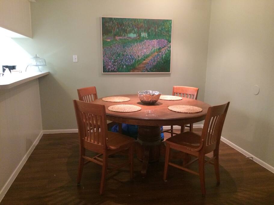 The dining table provides ample seating for everyone.