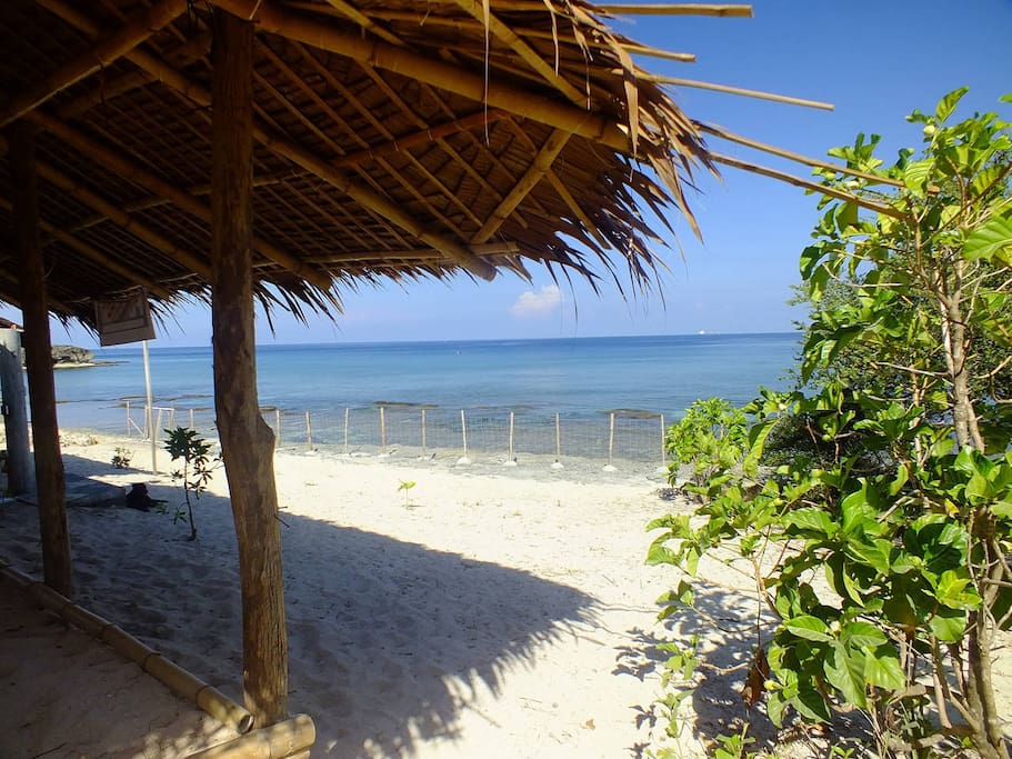 Direct beachfront with white sand. An outside salar gives you the amenity of a private cosy, shadowed place.