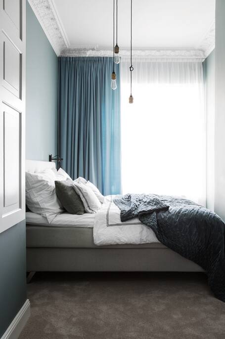 Bedroom with 180 cm bed and tv.