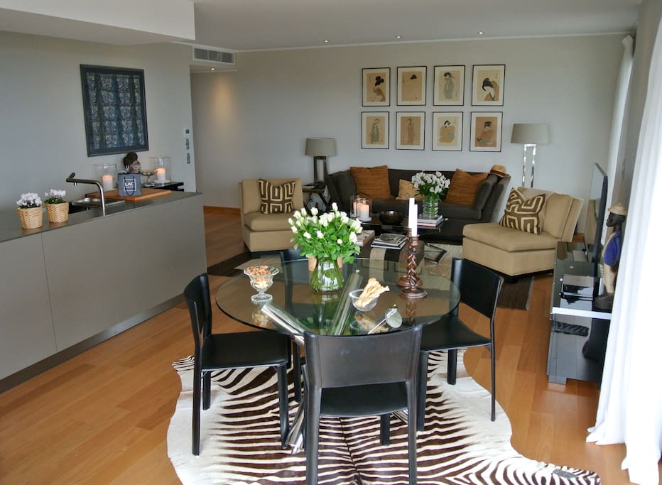 Spacious living room with indoor dining area.