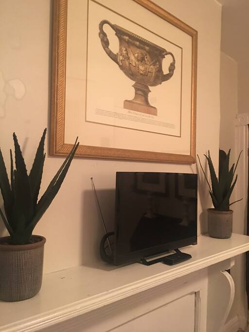 Mantel with TV set up for streaming music or shows