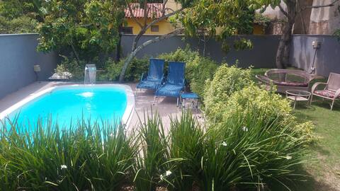 Casa Tropicana: Centro de Itaúnas-Piscina e Jardim