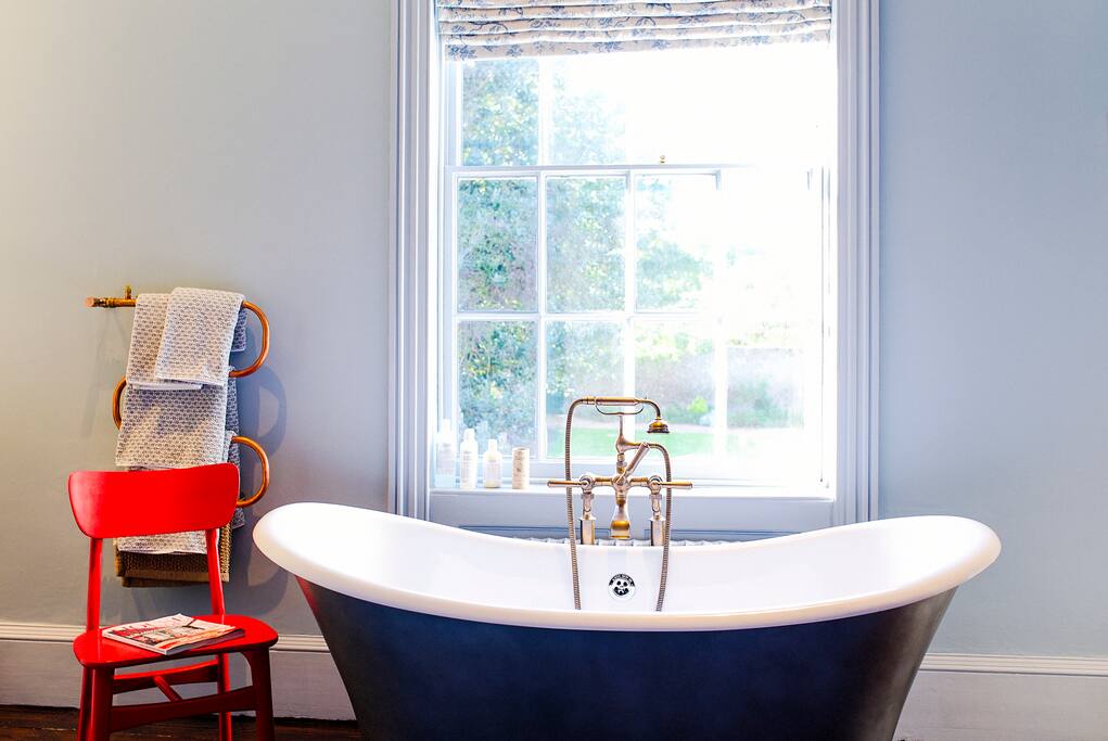 The Large Double with free standing bath over looking Shepherd House's private walled garden