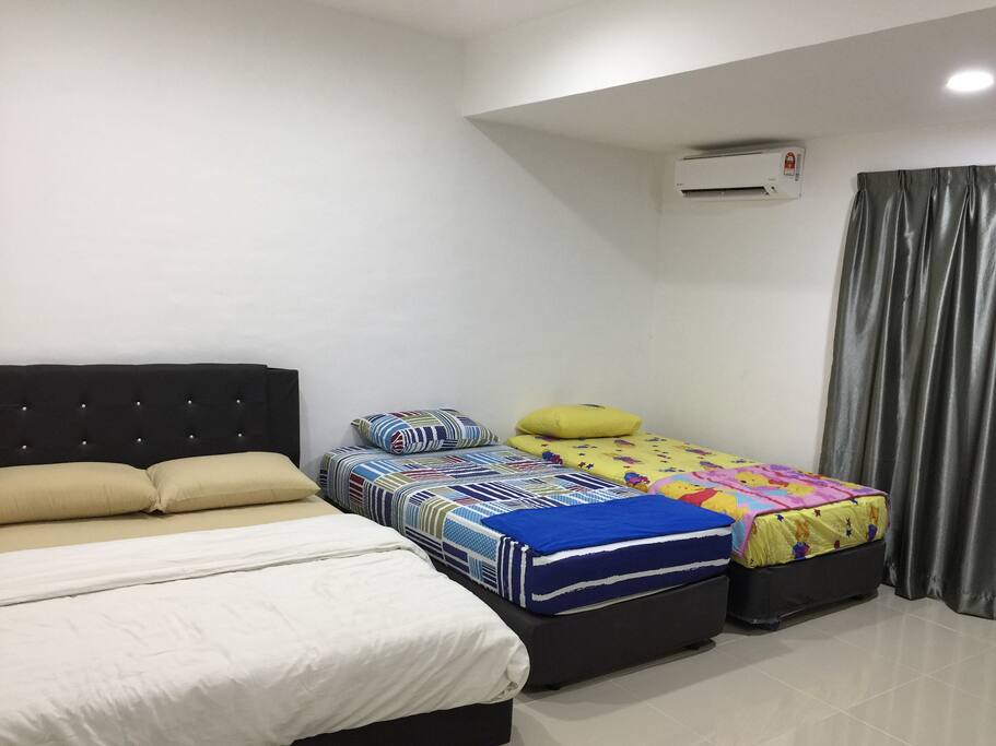 1 queen size bed, 2 single beds with attached toilet